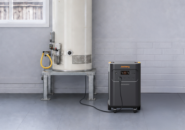 Jackery portable power station connected to a large cylindrical appliance